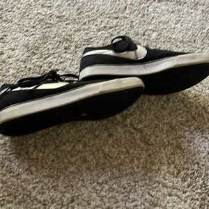 Black Nike gym shoes